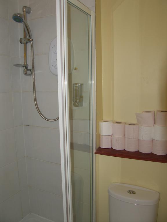 Regis Guest House EDI Pokoj fotografie