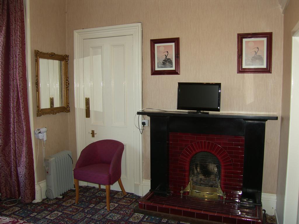 Regis Guest House EDI Pokoj fotografie